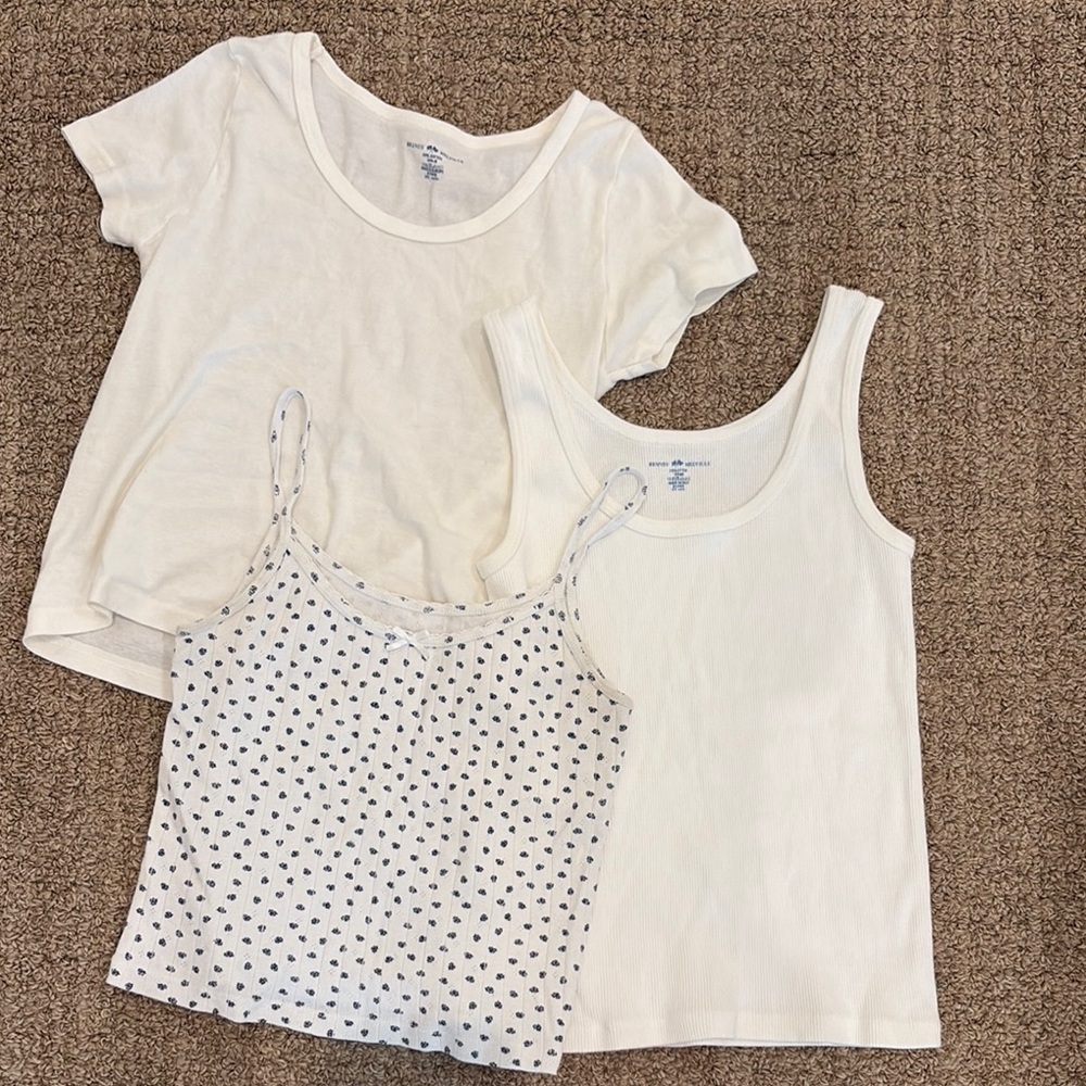 Brandy Melville: White top, white tank, and floral tank